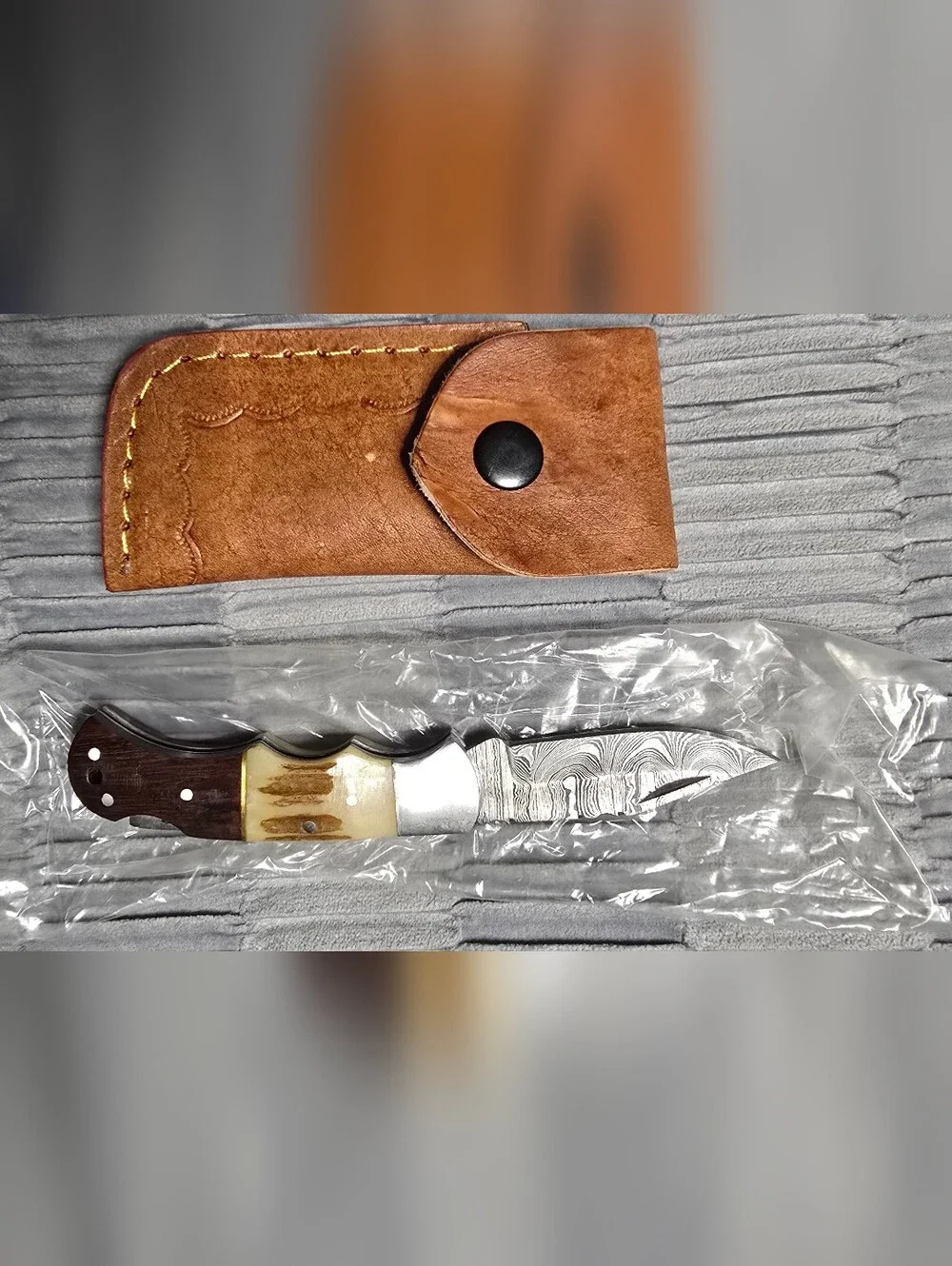 Custom Damascus Folding Knife with Tan Leather Sheath